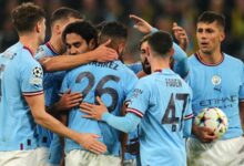 Riyad Mahrez is consoled by Man City team-mates after missing a penalty against Borussia Dortmund